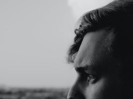 mans face in grayscale