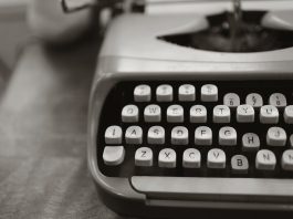 close up photo of gray typewriter
